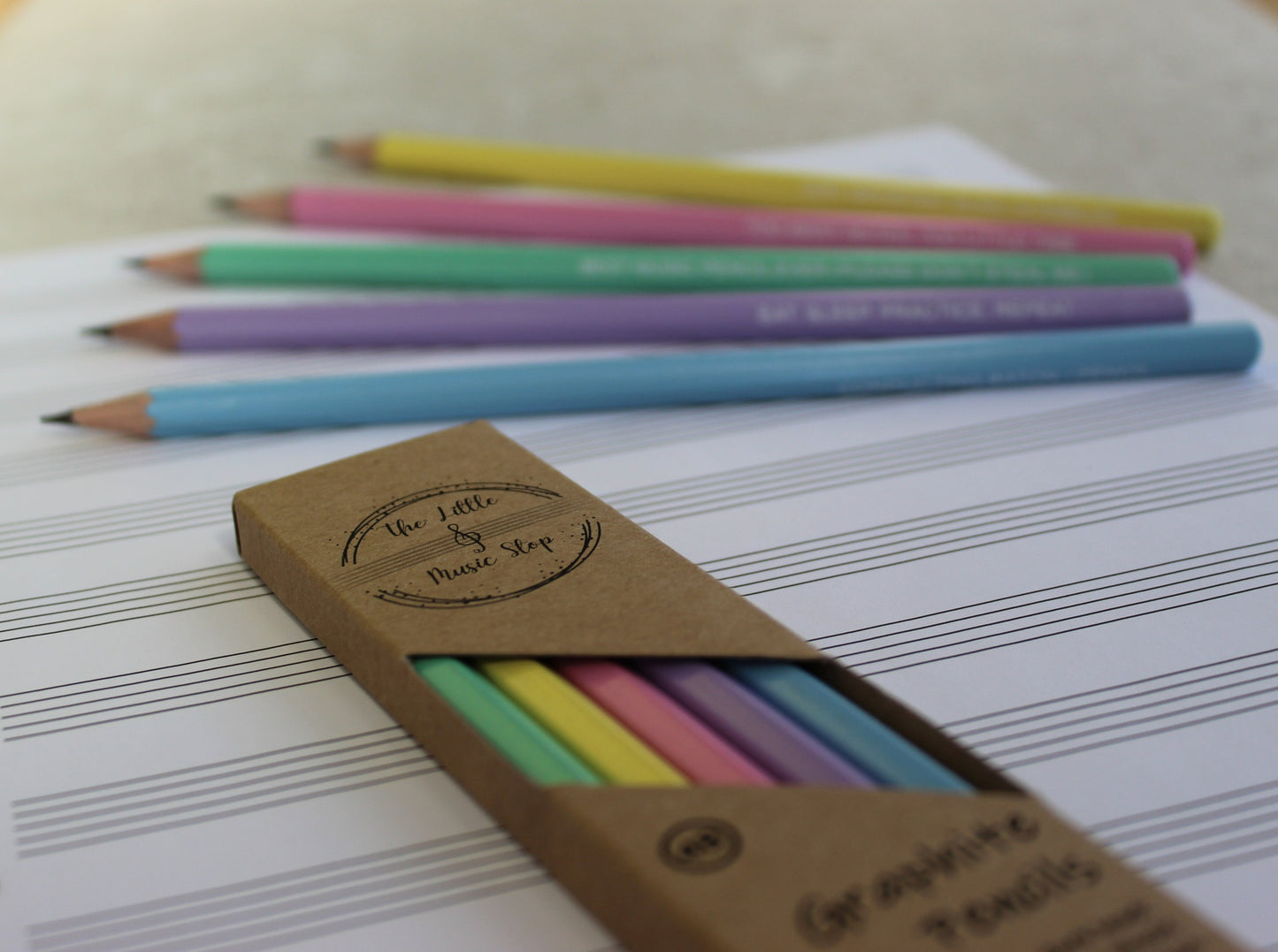 Pastel pencils in a kraft box.