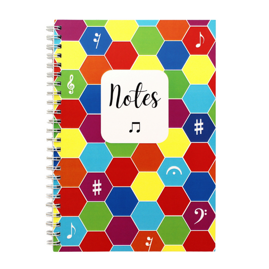 Music notebook with a colourful cover, featuring a multicoloured hexagonal design with musical symbols.