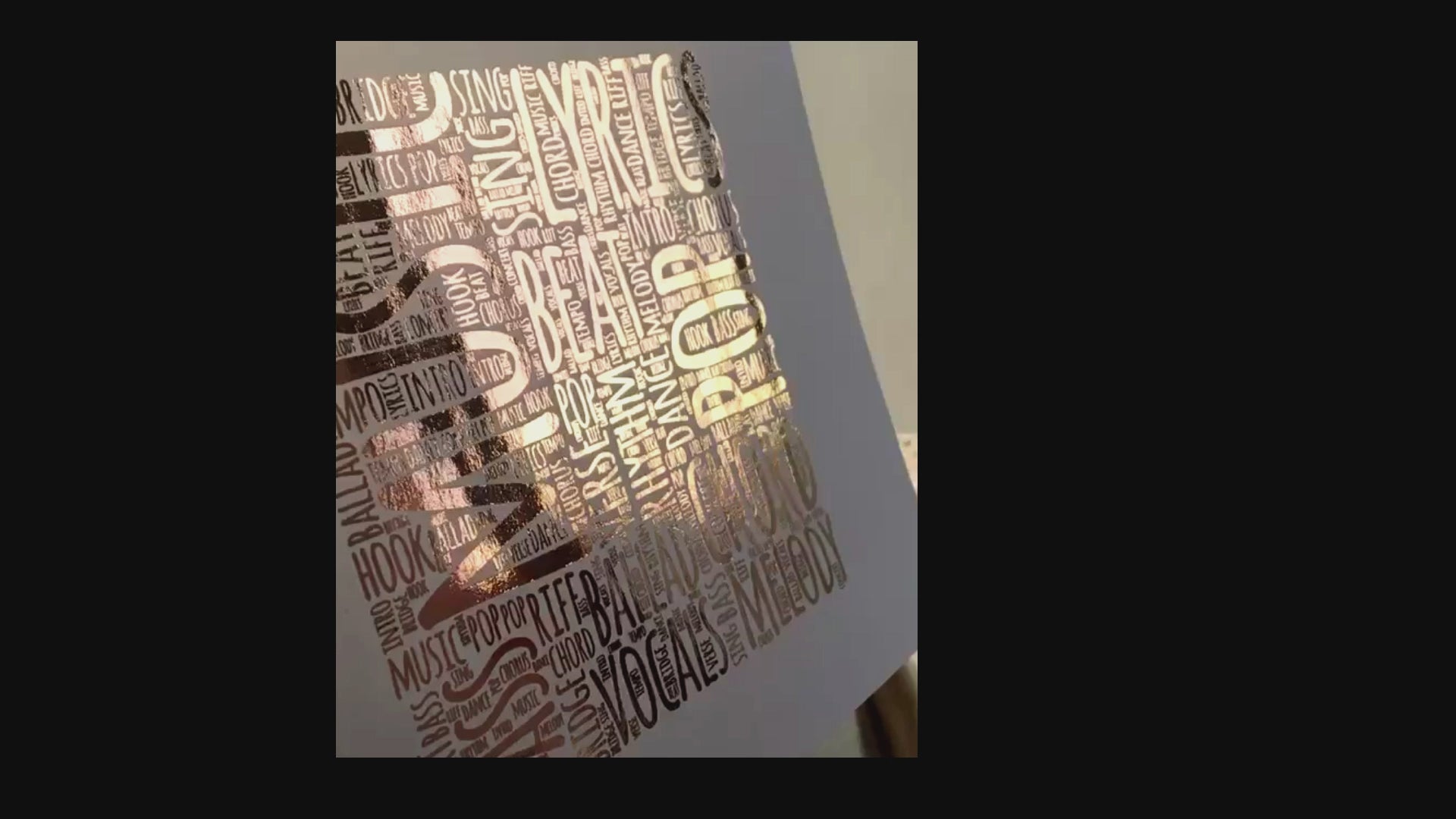 video of white card, rose gold foil