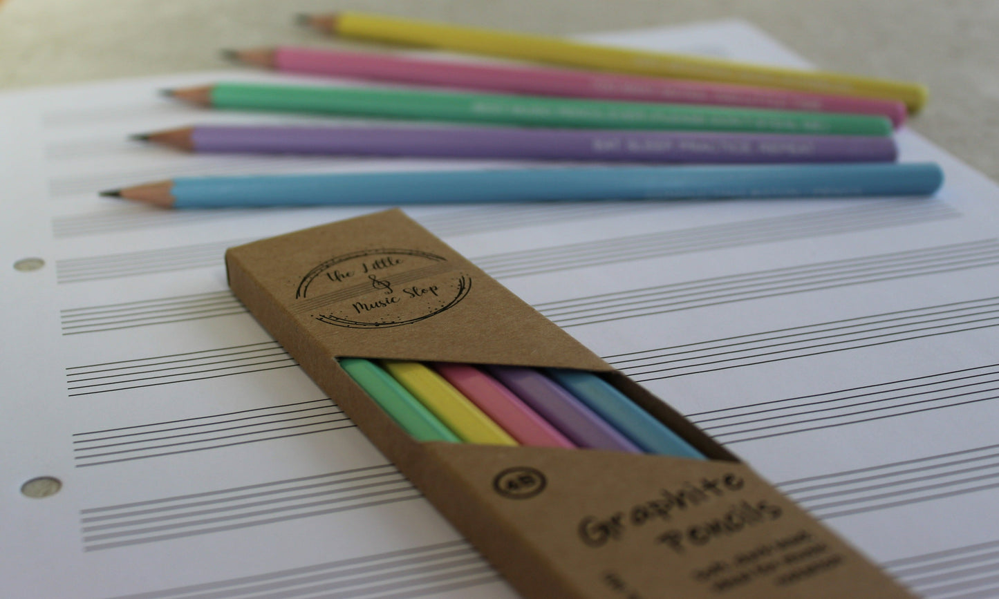 A pack of pencils in a box. Faded out image of loose pencils in the background.
